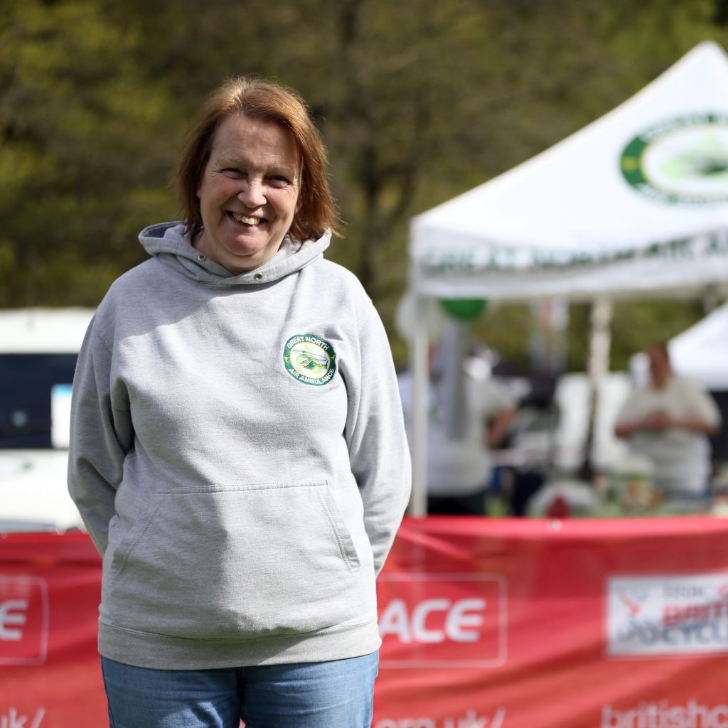 gnaas volunteer rita wearing great north air ambulance merchandise
