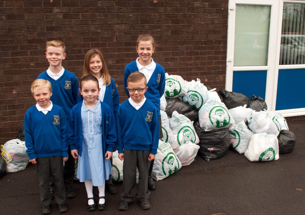 school pupils recycling clothing in aid of gnaas