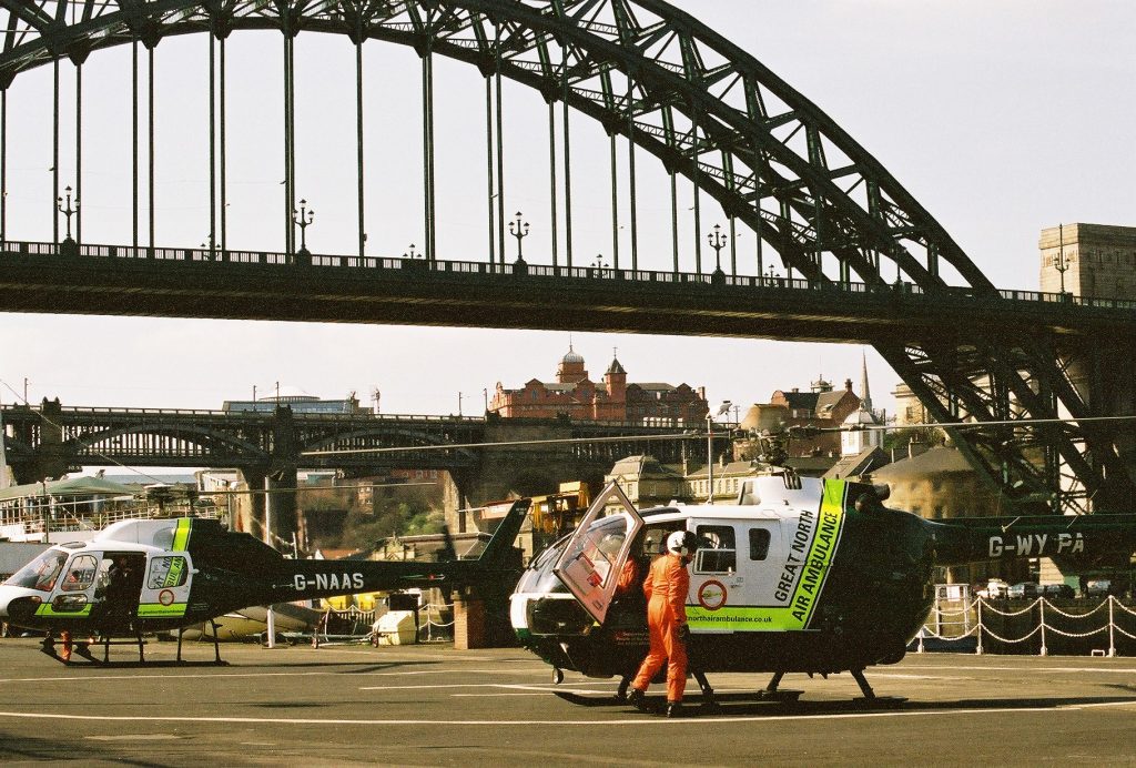 G-WYPA helicopter with G-NAAS helicopter at Tyne Bridge