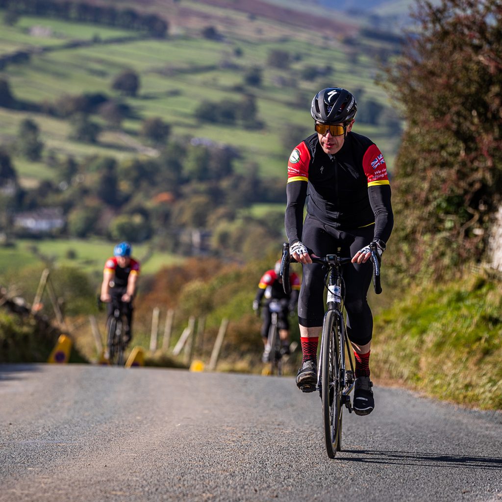 A cyclist at the top of the Stang hill climb