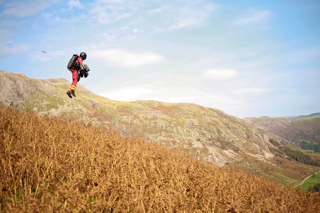 Jet suit paramedic hovering over Lake District fields