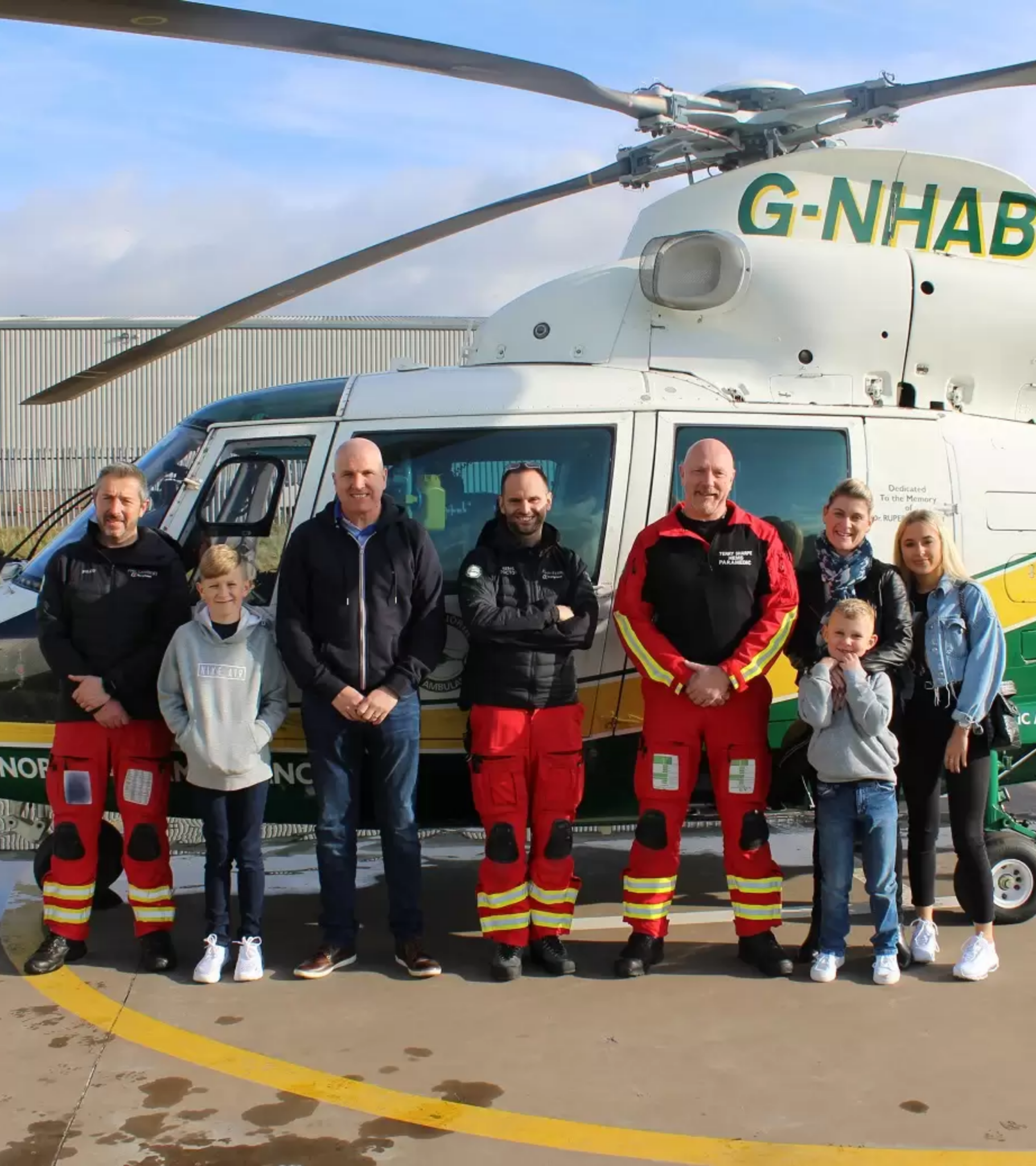 The McCrickard's in front of our helicopter